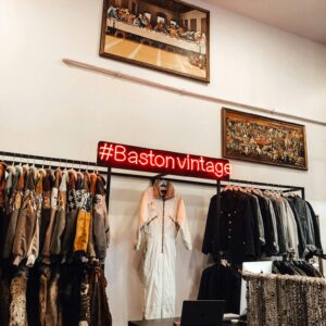 Stylish vintage shop with clothes